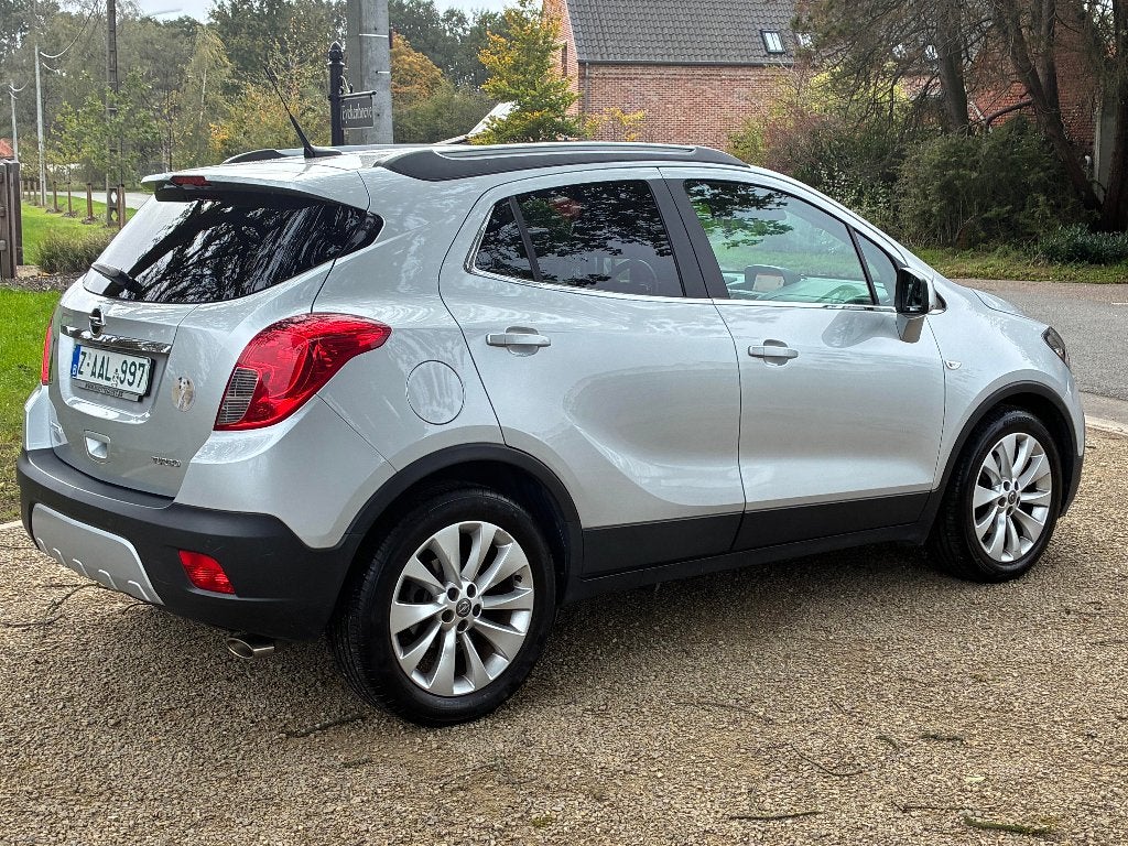Opel mokka cosmo 1.4 benzine. Amper 60.000km. Vele opties., Auto's, Voorwielaandrijving, Dealer onderhouden, Euro 6, 4 cilinders