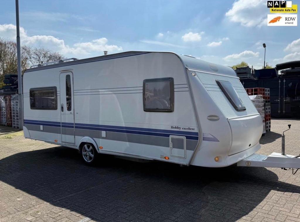 Hobby 560 Excellent * 250 breed * Mover * Voortent * Luifel, Omvormbare zithoek, Rondzit, Particulier, 5 tot 6 meter