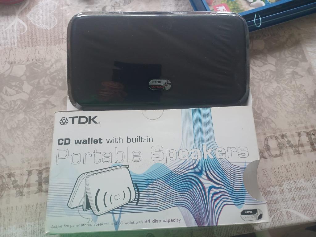 Cd wallet met portable speakers, Verzenden