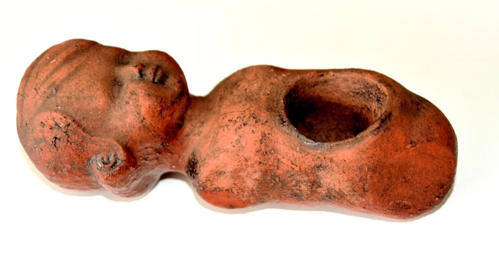 Poppenlijfje terracotta, Ophalen