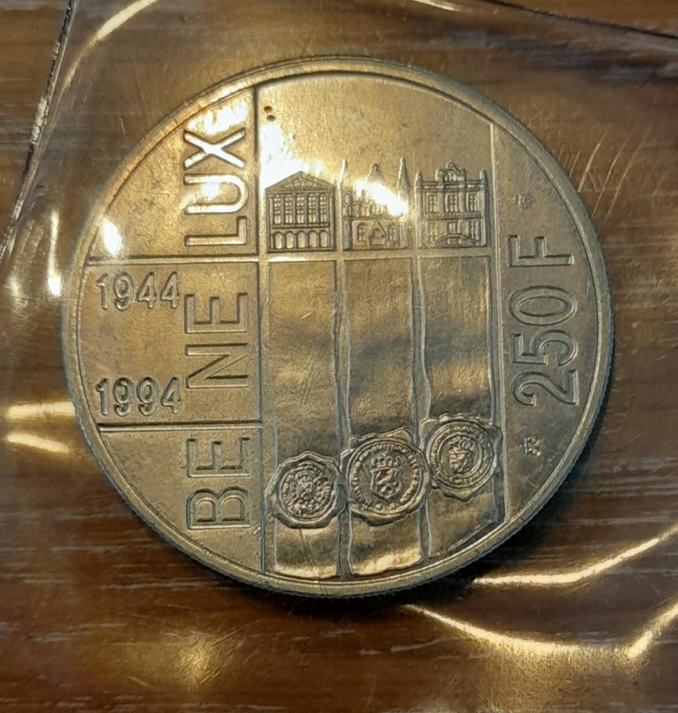 3 oude muntstukken van 250 fr !, Ophalen