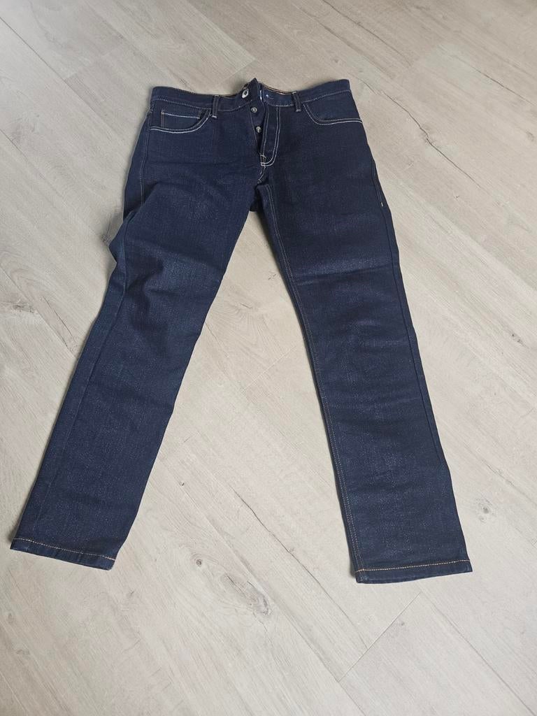 Motor broek jeans, Ophalen