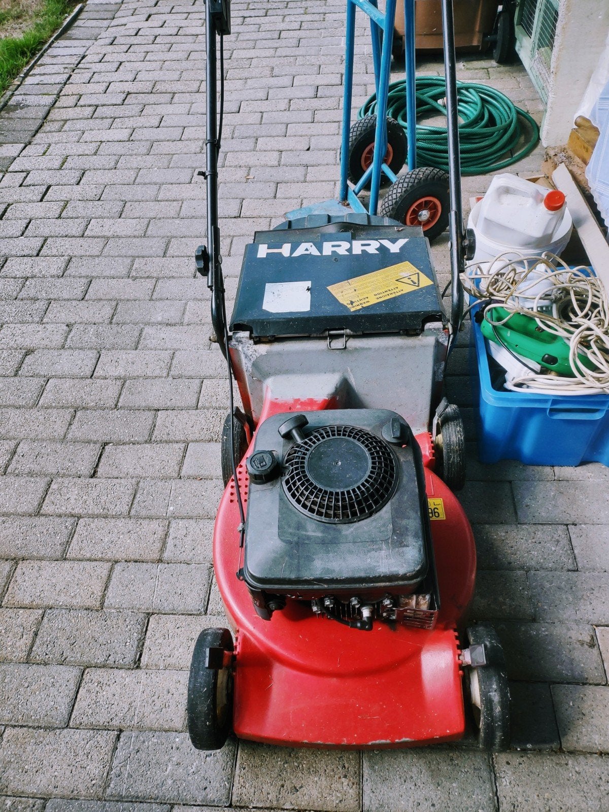 Grasmaaier., Ophalen