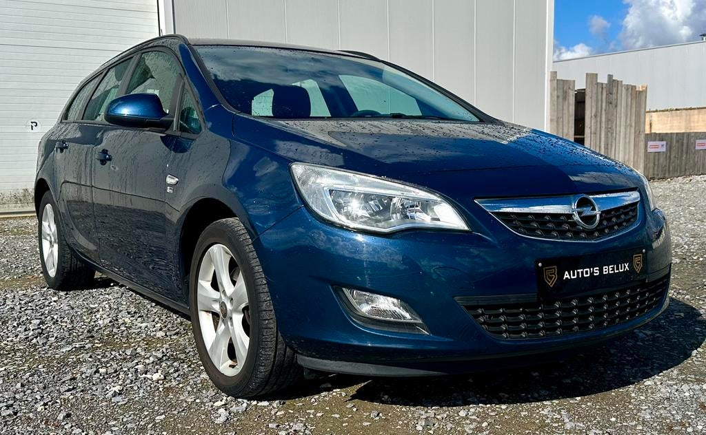 Opel Astra Sports Tourer 1.6 Turbo Enjoy 150 Years, Auto's, Voorwielaandrijving, Euro 5, Zwart, 4 cilinders