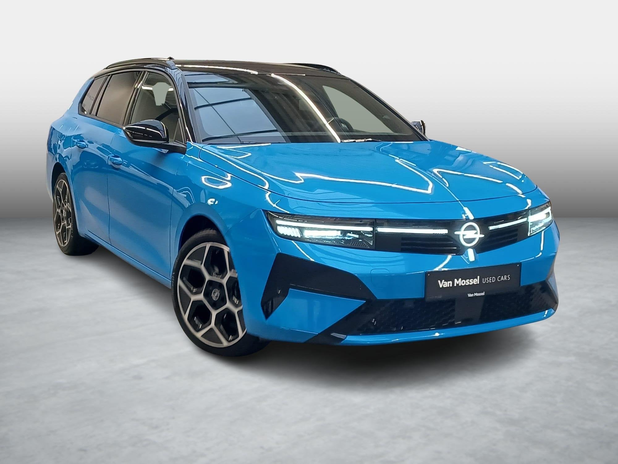 Opel Astra Sports Tourer 1.2T Hybrid 145pk GS + Comfort Pack, Dealer onderhouden, Gebruikt, Blauw, Bedrijf