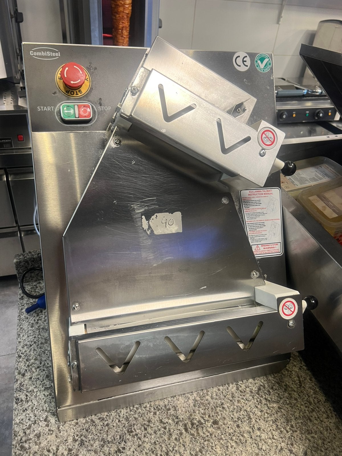 Deegroller turksepizza machine, Enlèvement