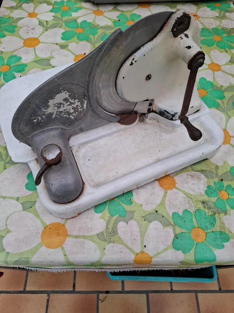 Antiek snijmachine, Ophalen