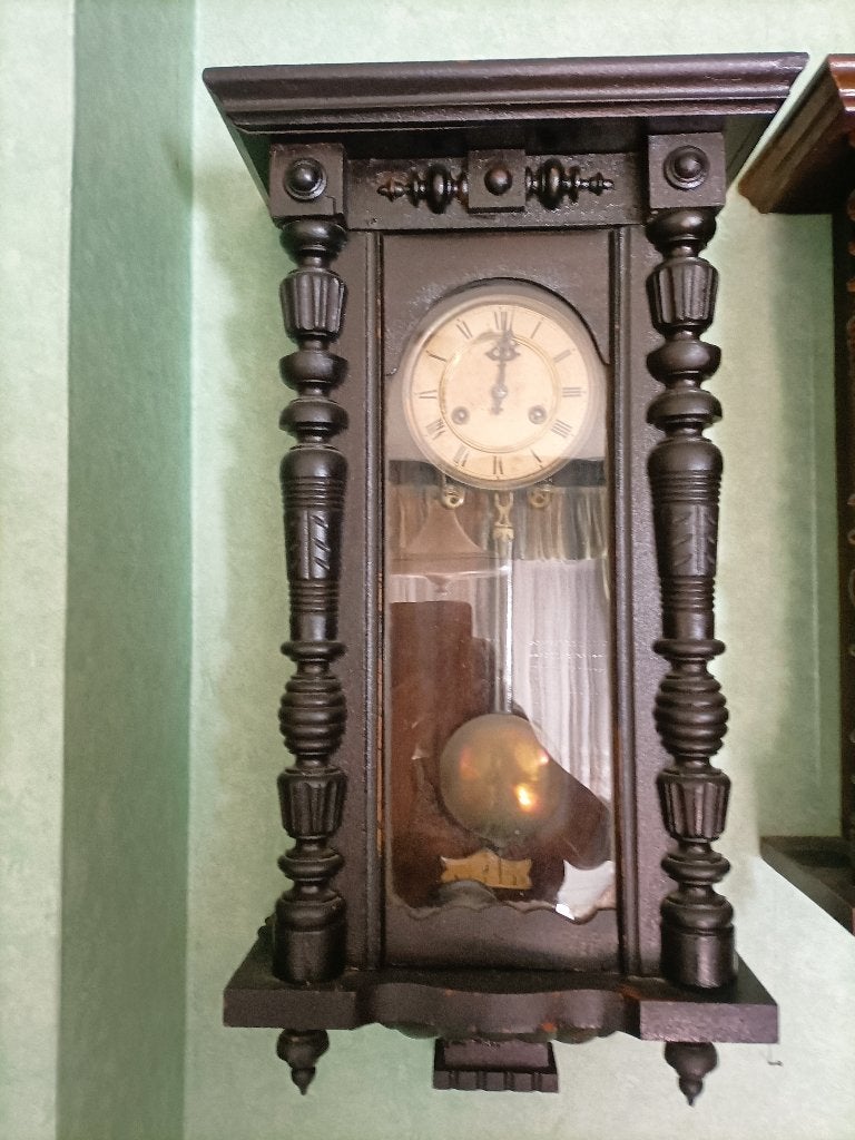 antieke klok met slinger, Ophalen