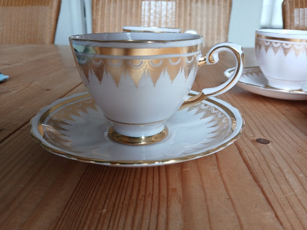 Vintage theekopjes met schotel, Ophalen