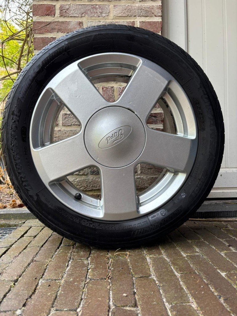 4 originele Ford Fiesta 15" velgen + banden, Auto-onderdelen, Banden en Velgen, Ophalen, Gebruikt, 15 inch, Banden en Velgen