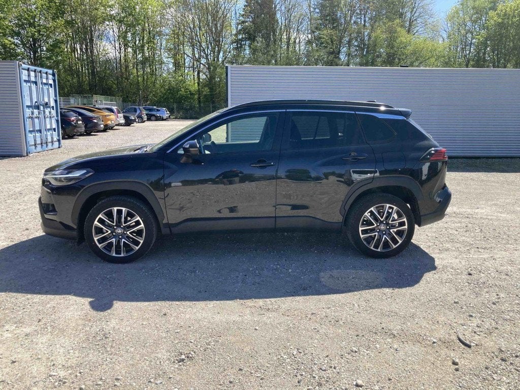 Toyota Corolla Cross 1.8 Hybrid Style | Achteruitrijcamera |, Auto's, Stof, Gebruikt, 750 kg, 4 cilinders