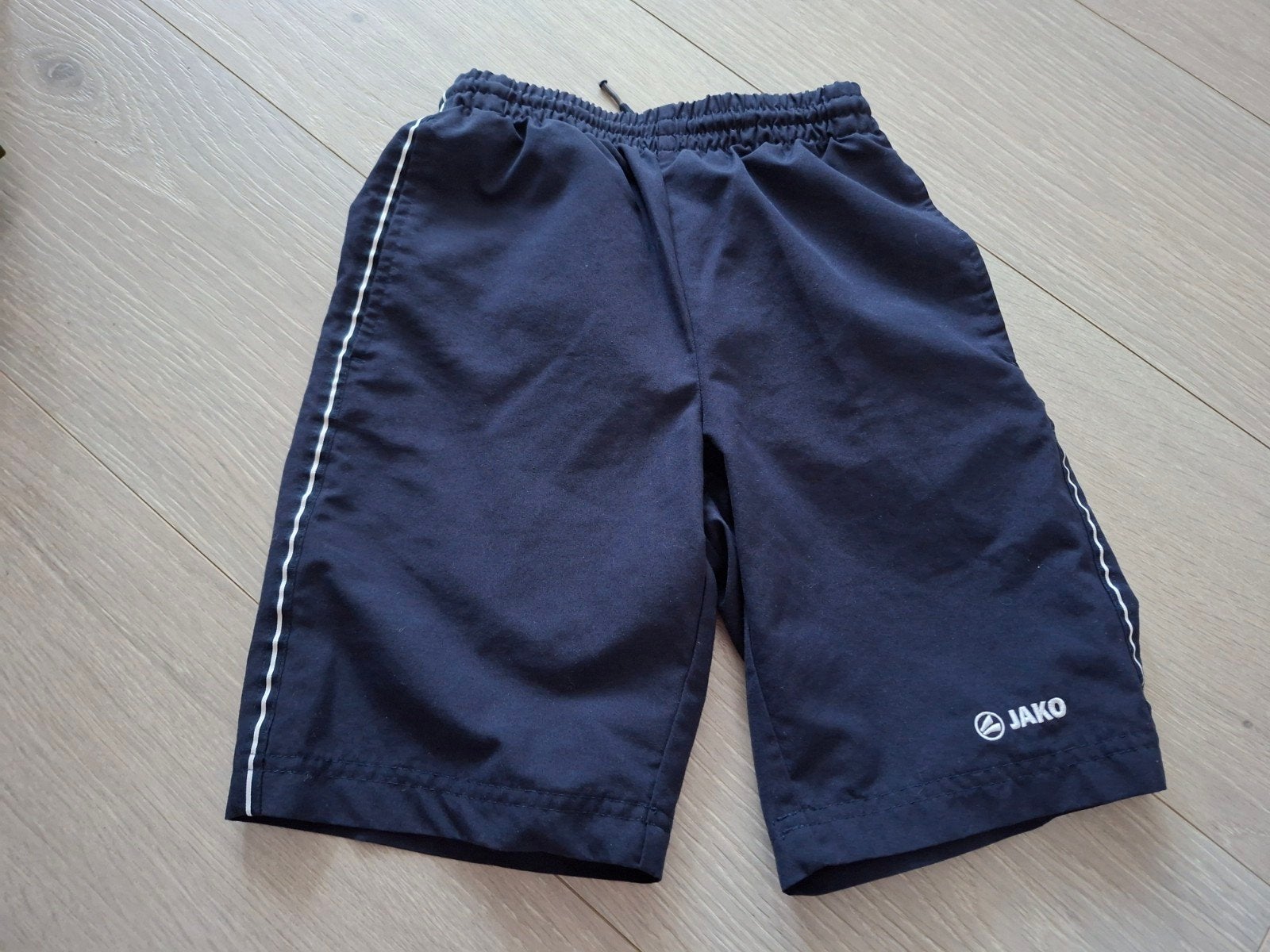 short Jako M122/128, Enfants & Bébés, Maillots de bain pour enfants, Enlèvement ou Envoi, Utilisé, Garçon
