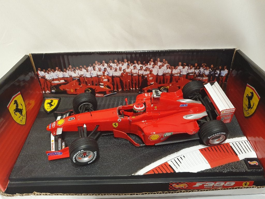 Eddie Irvine Ferrari F399 Hotwheels 1999 1:18, Enlèvement ou Envoi, Comme neuf, Voiture, Hot Wheels
