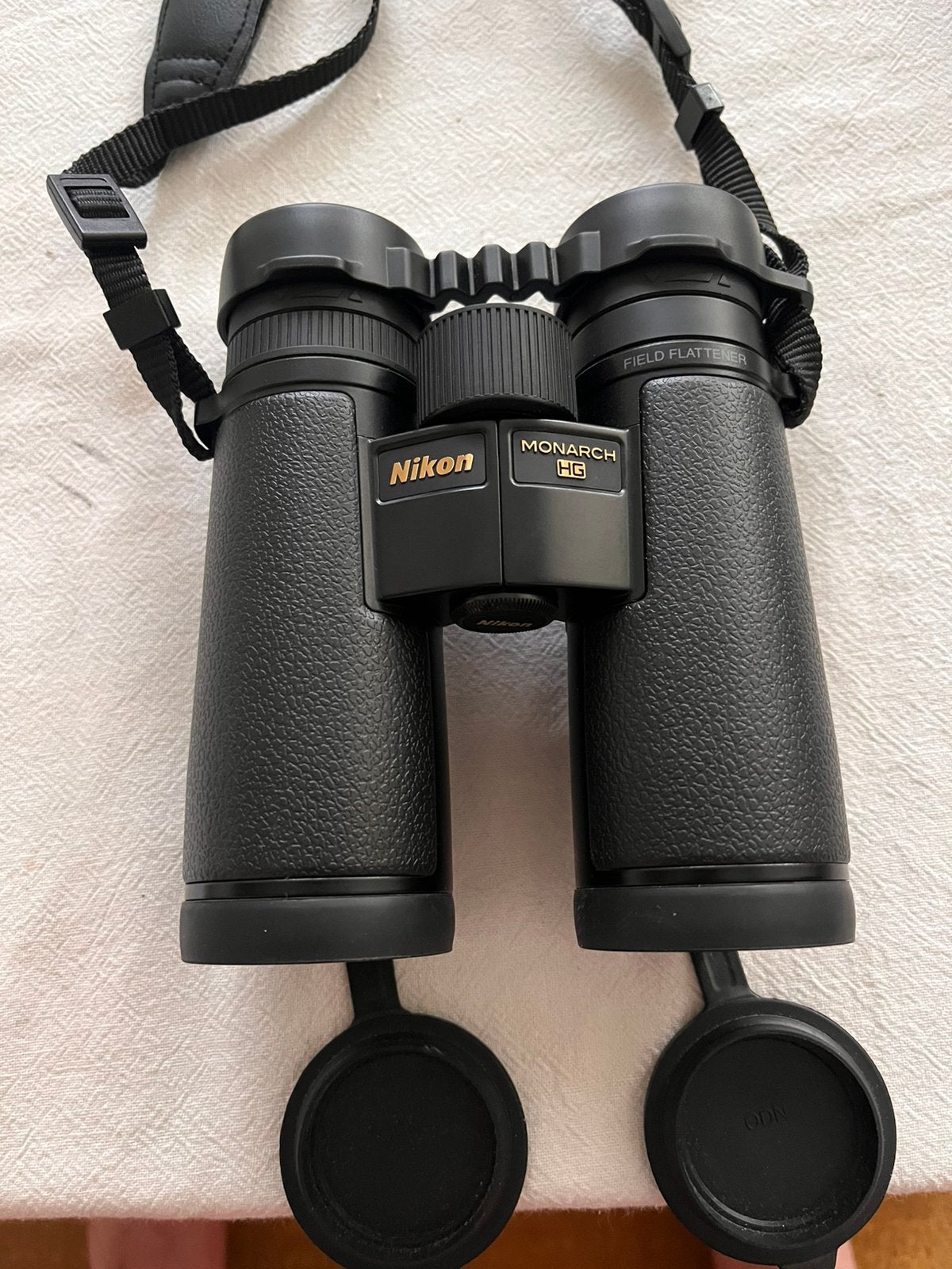Jumelles Nikon Monarch HG 10*42 en parfait état., Enlèvement, Comme neuf