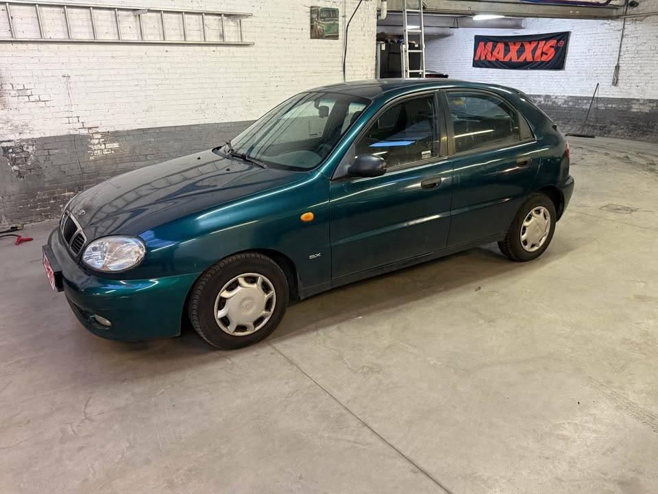 Daewoo Lanos 1.5I ***benzine / 127.748km / Airco***, Auto's, Daewoo, Voorwielaandrijving, Stof, 63 kW, 4 cilinders