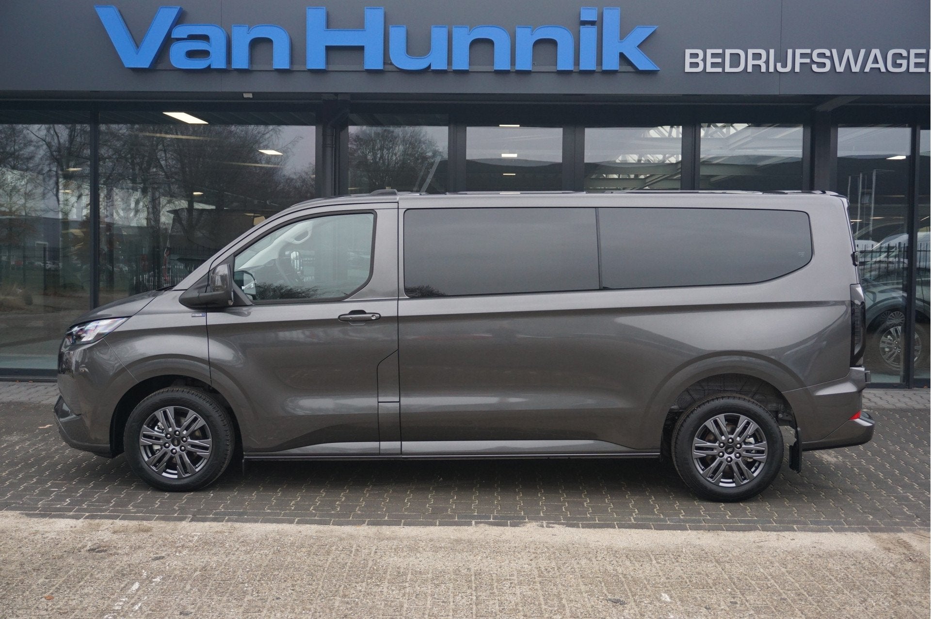 Ford Transit Custom 320L 2.5 PHEV 233PK Dubbel Cabine Limite, Auto's, Gebruikt, 4 cilinders, Bedrijf, Hybride Elektrisch/Benzine