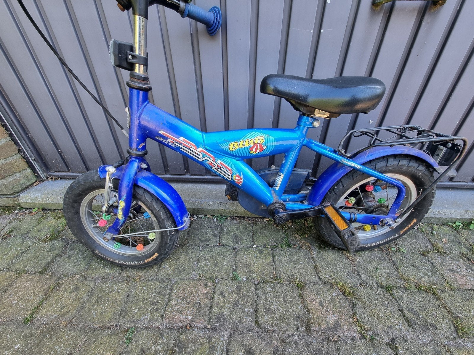 Eerste kinderfietsje ( dikke bandjes), Ophalen