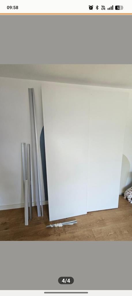 Witte schuifdeuren Ikea, Ophalen