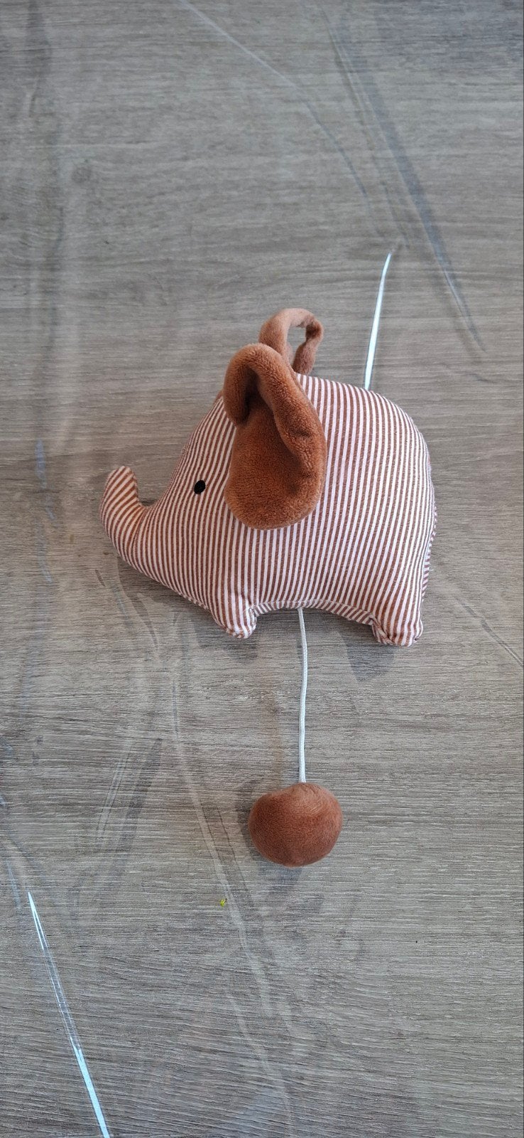 muziekmobiel olifant, Ophalen
