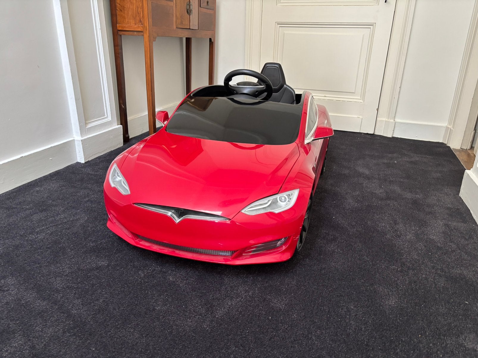 Rode Tesla kinder accu speelauto. In goede staat, Ophalen of Verzenden, Zo goed als nieuw