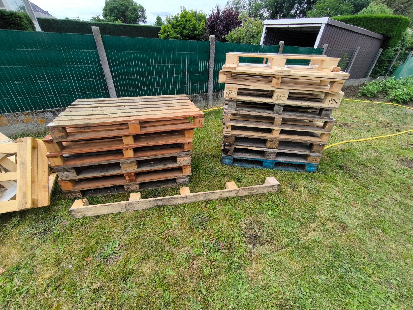 Houten palletten., Ophalen