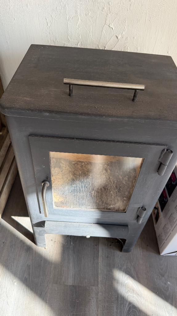 Houtkachel met schouwbuis inox, Ophalen