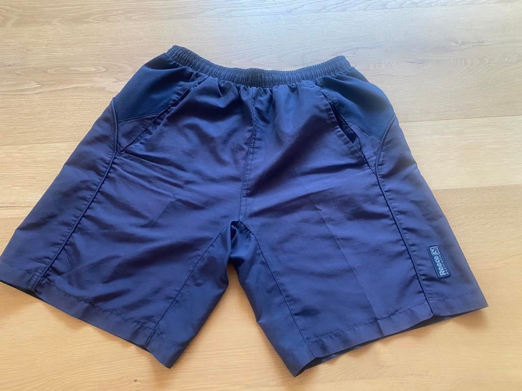 Donkerblauwe sportshort Reece - maat small, Sport en Fitness, Hockey, Ophalen of Verzenden, Gebruikt, Kleding