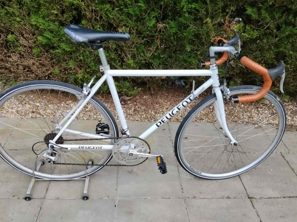 Witte Peugeot koersfiets smal kader in zeer goede staat, Fietsen en Brommers, 28 inch, Gebruikt, 10 tot 15 versnellingen, Velgrem