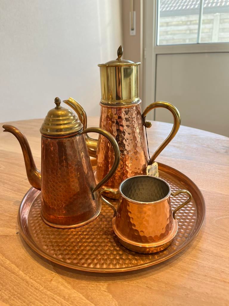 Koperen set., Ophalen