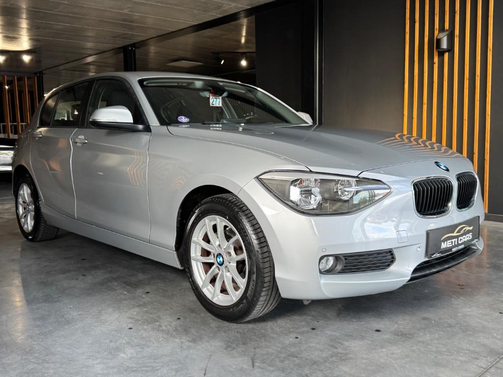 BMW 116 i Urban Line | Cruise Control | Navi | Sensoren |, Auto's, 100 kW, Adaptieve lichten, Zwart, 5 deurs