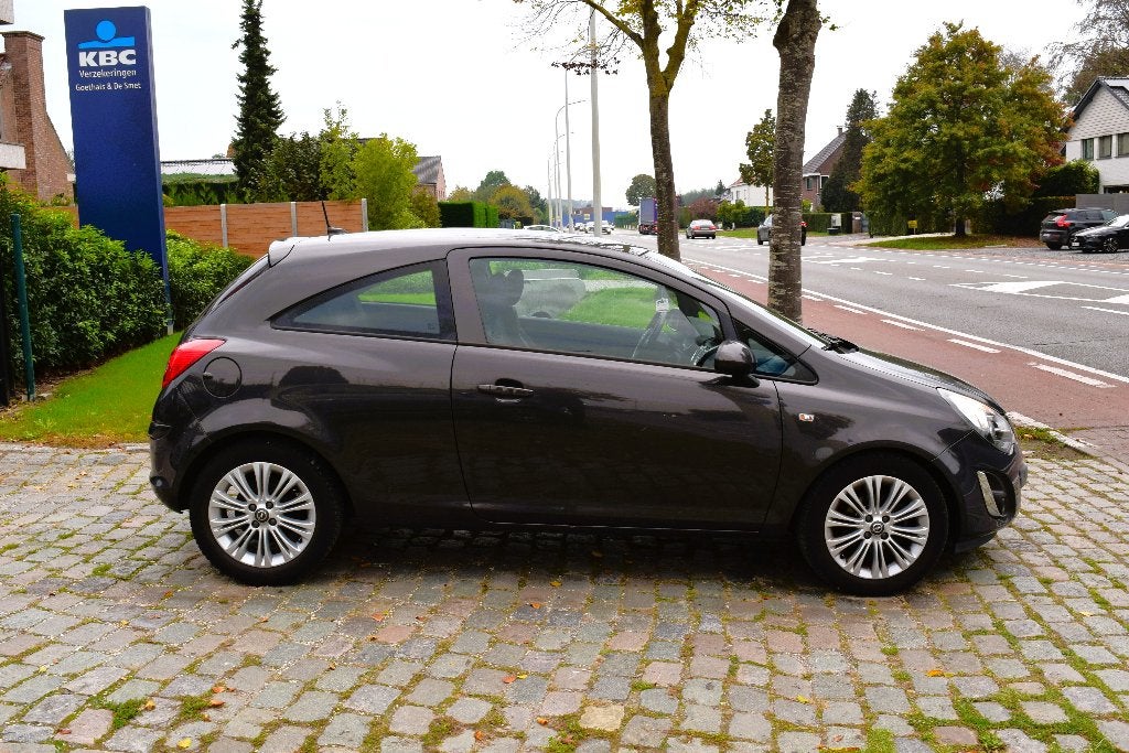 Opel Corsa 1.4i/GPS/LEDER/HISTORY/GARANTIE, Auto's, Voorwielaandrijving, Euro 5, Zwart, 4 cilinders