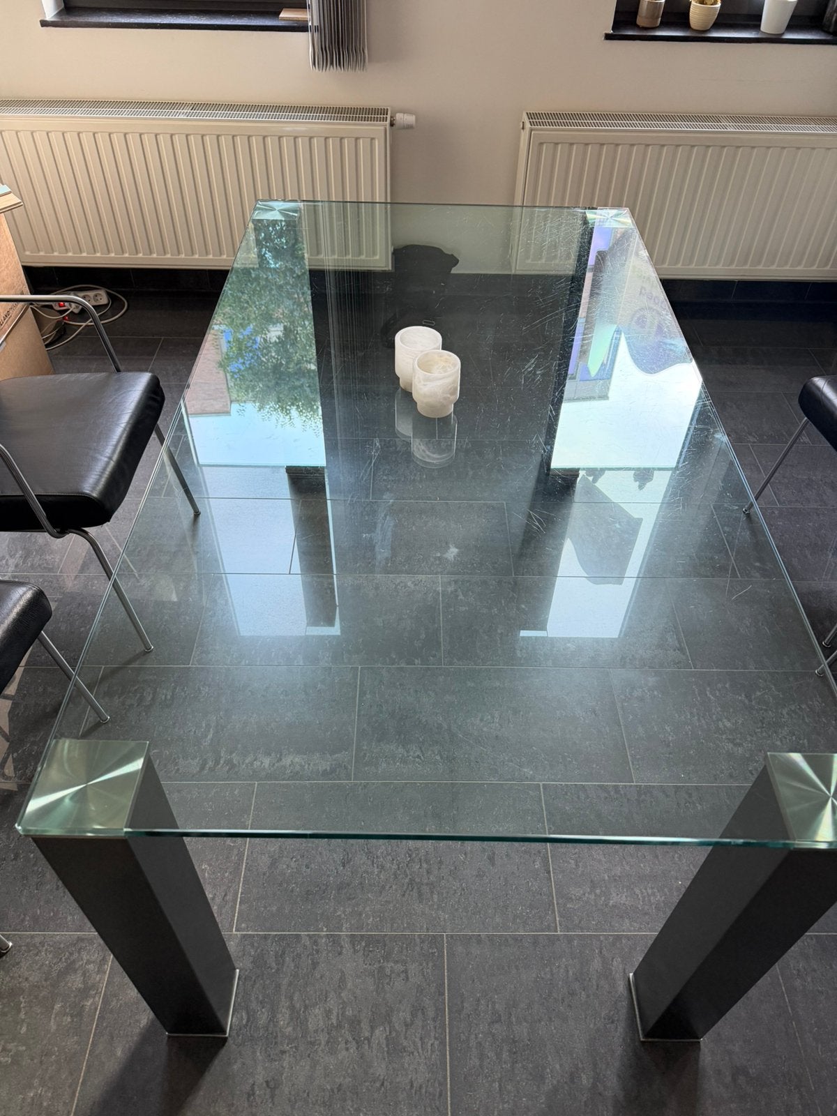 Glazen eettafel met geborsteld stalen poten, Ophalen, Gebruikt, 50 tot 100 cm, Glas
