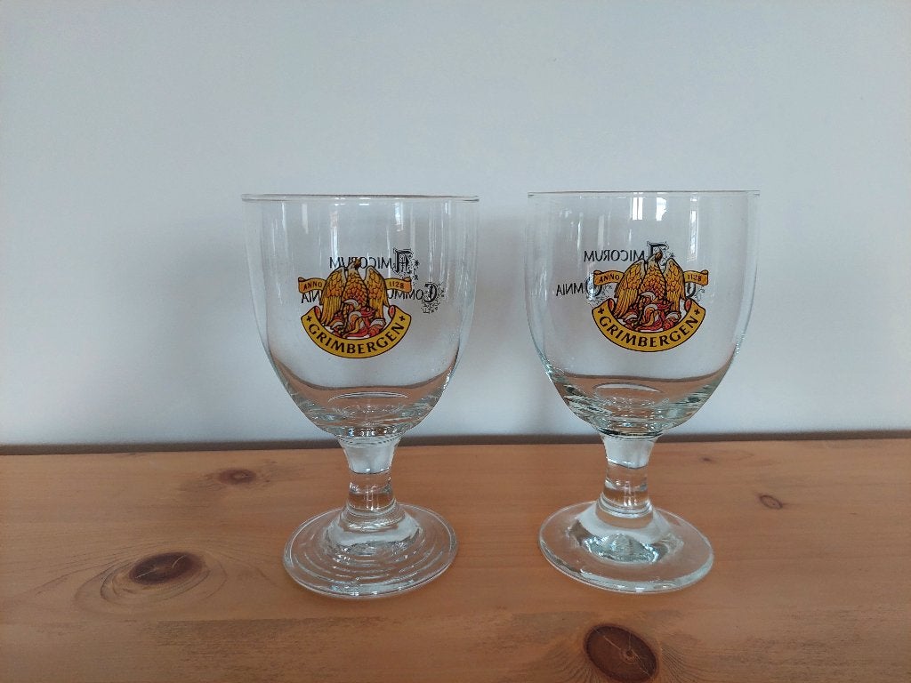 2 Grimbergen glazen „Amicorum Communia Omnia”, Verzamelen, Ophalen of Verzenden, Zo goed als nieuw, Bierglas