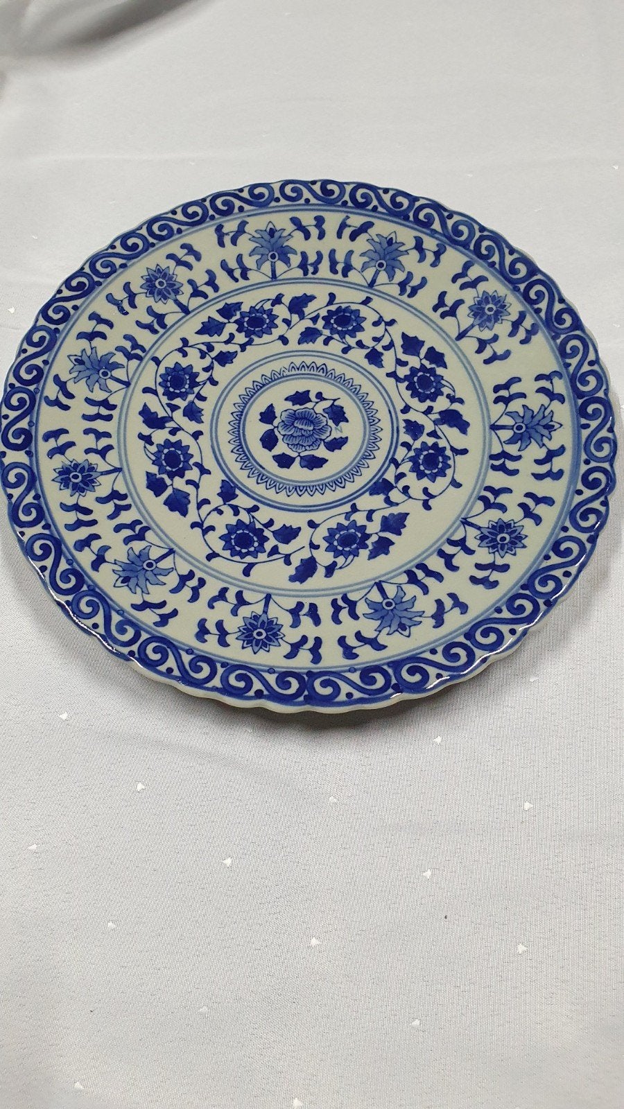 Chinees porseleinen bord, Ophalen