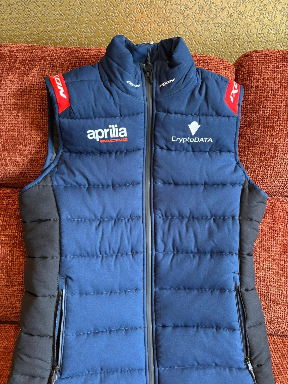 Ixon Bodywarmer Lady Aprilia Racing CryptoDATA Maat L, Ophalen of Verzenden, Zo goed als nieuw, Maat 52/54 (L)
