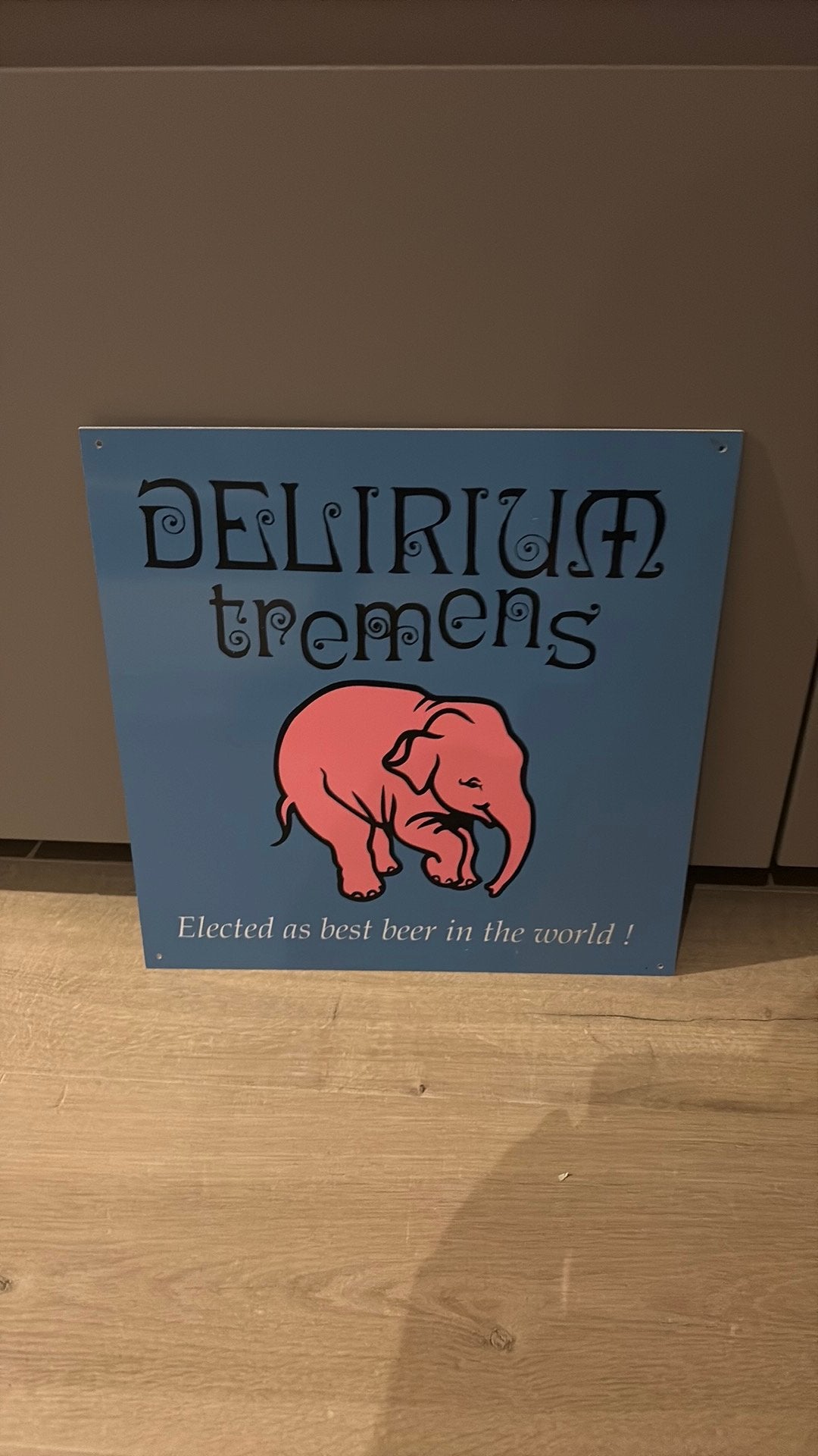 Bord delirium in harde plastic, Ophalen, Zo goed als nieuw, Reclamebord