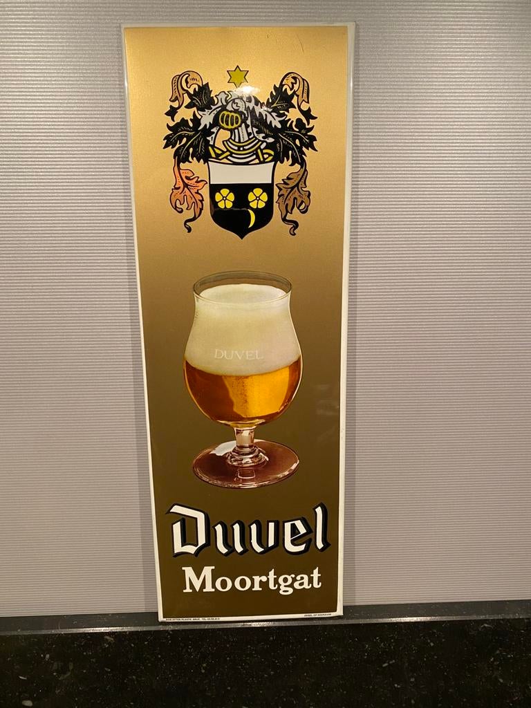 DUVEL reclamebord 1976 in zeer goede staat 46,5 x 15,8 cm, Verzamelen, Ophalen of Verzenden, Zo goed als nieuw, Reclamebord, Plaat of Schild