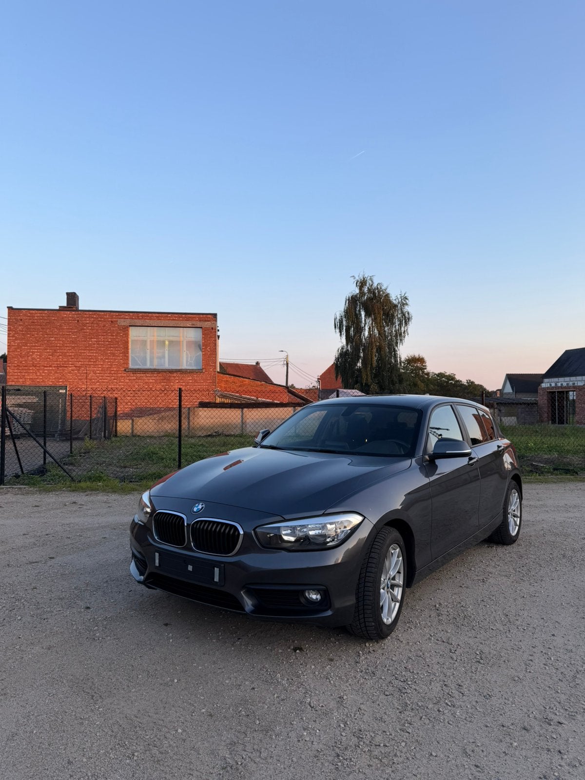 Bmw 116i 2018, Auto's, LED dagrijverlichting, Bedrijf, 3 cilinders, Zilver of Grijs