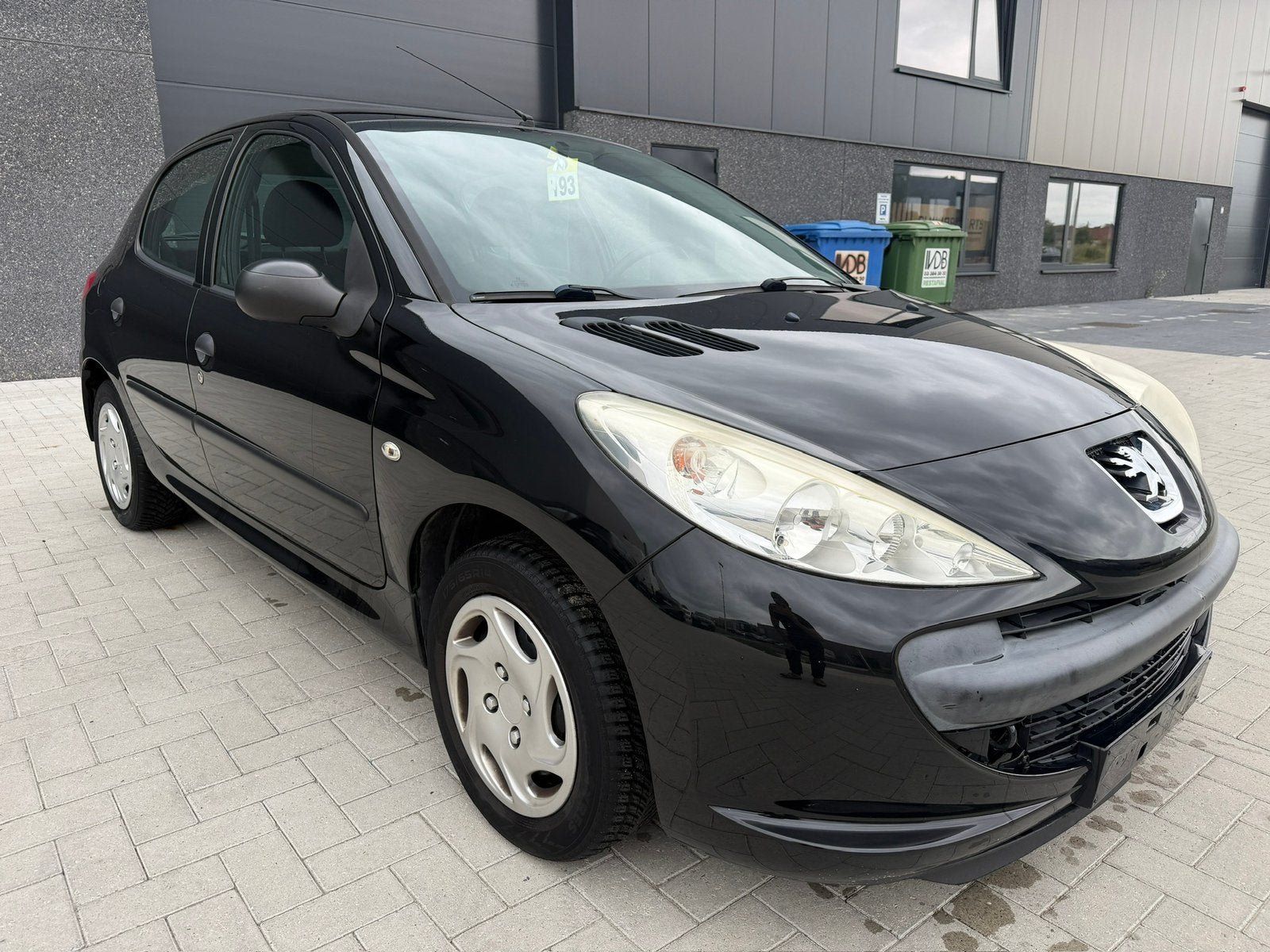 Peugeot 206+ 1.2 benzine met 117.000 km, Auto's, Peugeot, Voorwielaandrijving, Euro 5, Stof, Zwart