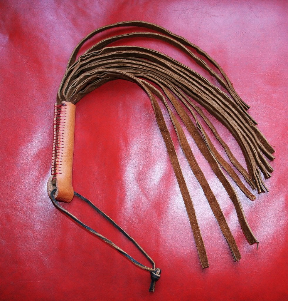 Flogger in dubbelgestikt bruin suede leder, Enlèvement ou Envoi