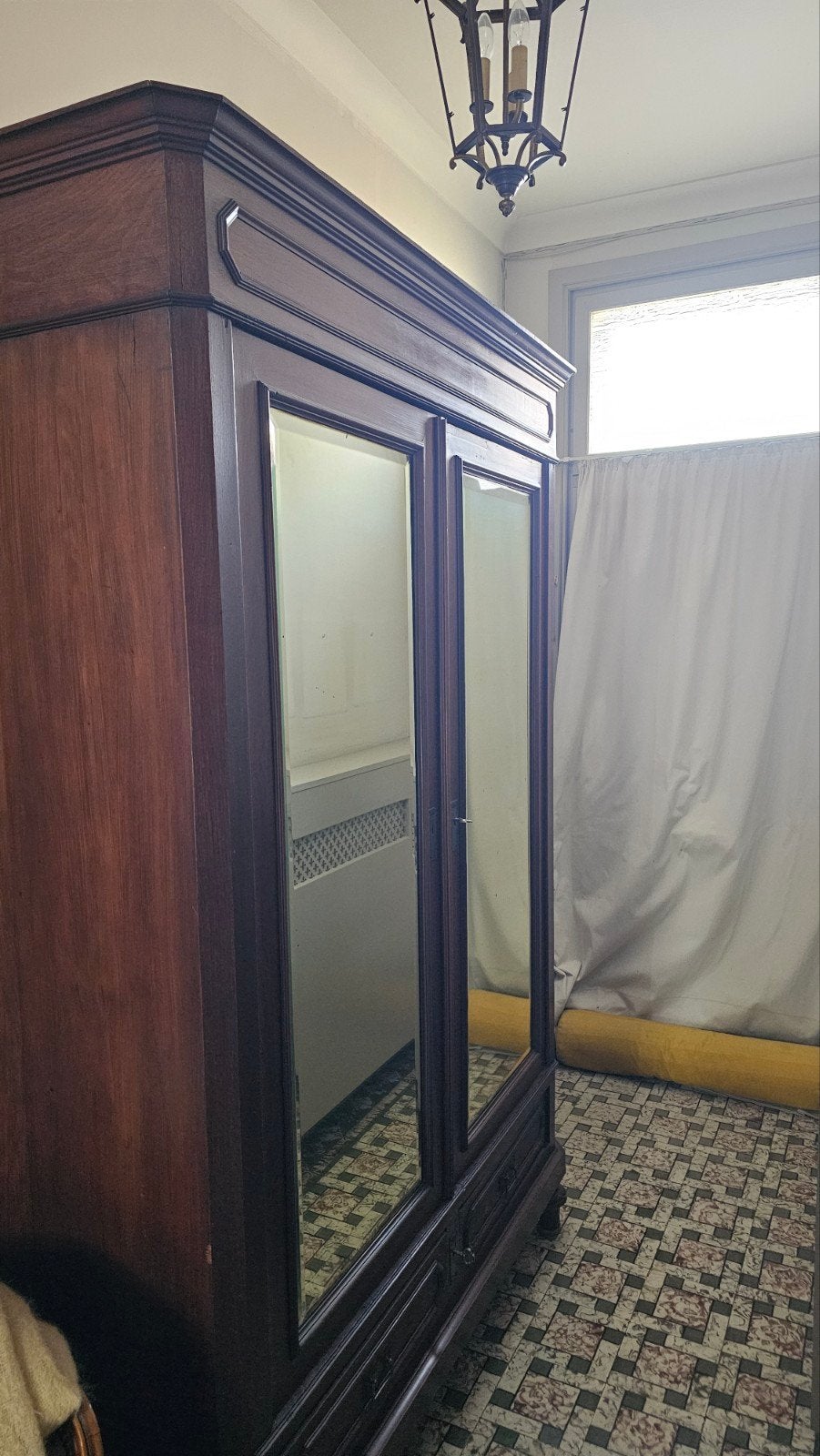 Antieke kast met spiegeldeuren, Enlèvement