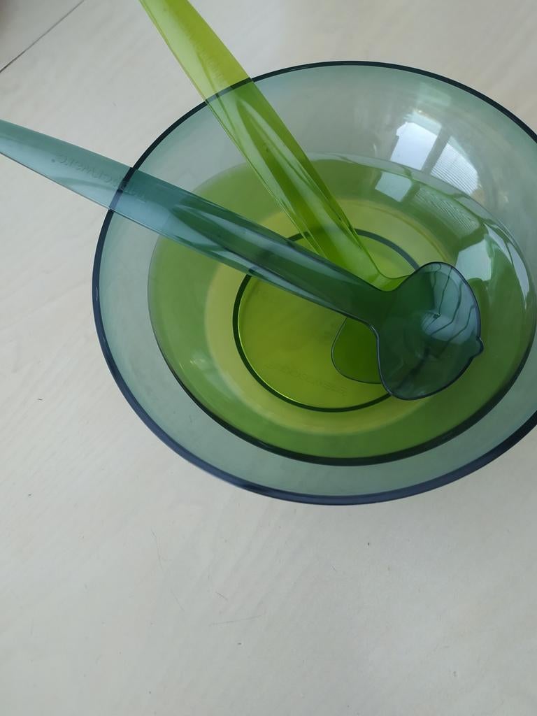 Slakom met slacouvert van tupperware, Ophalen