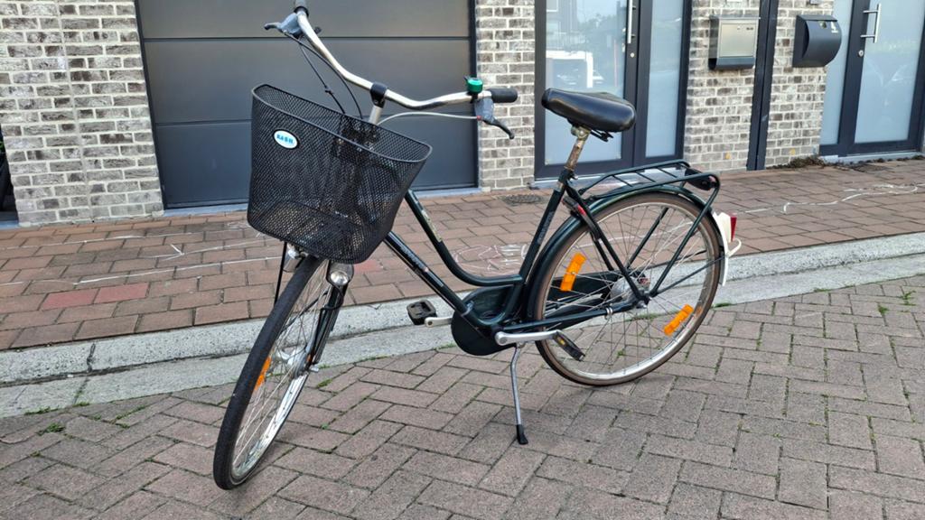 Damesfiets met mandje, Ophalen