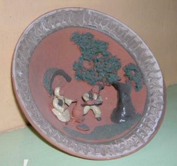 Bord in aardewerk, Ophalen