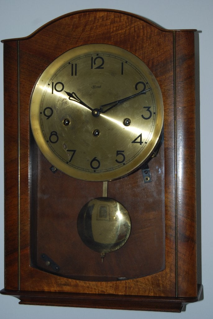Antieke hangklok., Ophalen