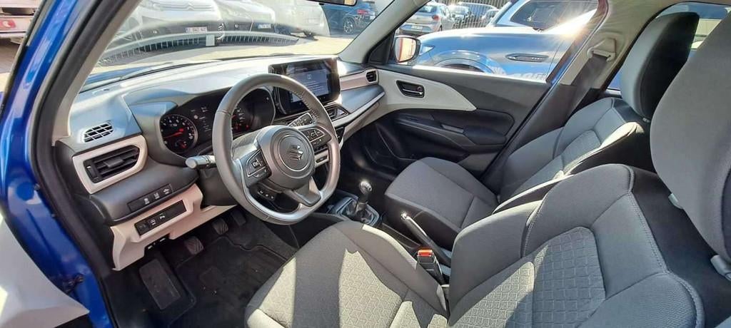 Suzuki Swift 1.2i SHVS Grand Luxe + 12V, Auto's, Gebruikt, Blauw, Swift, Bedrijf