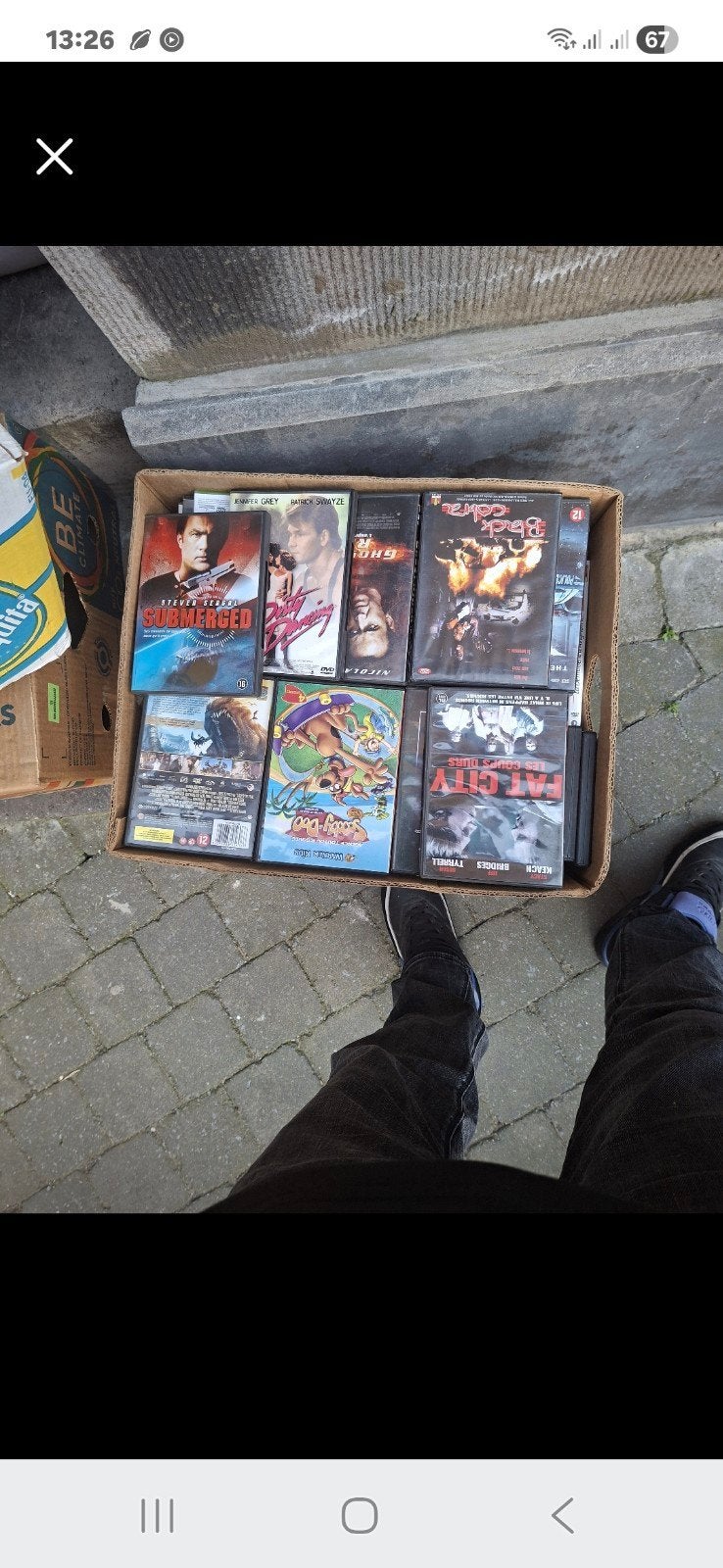 +-50 caisses de DVD