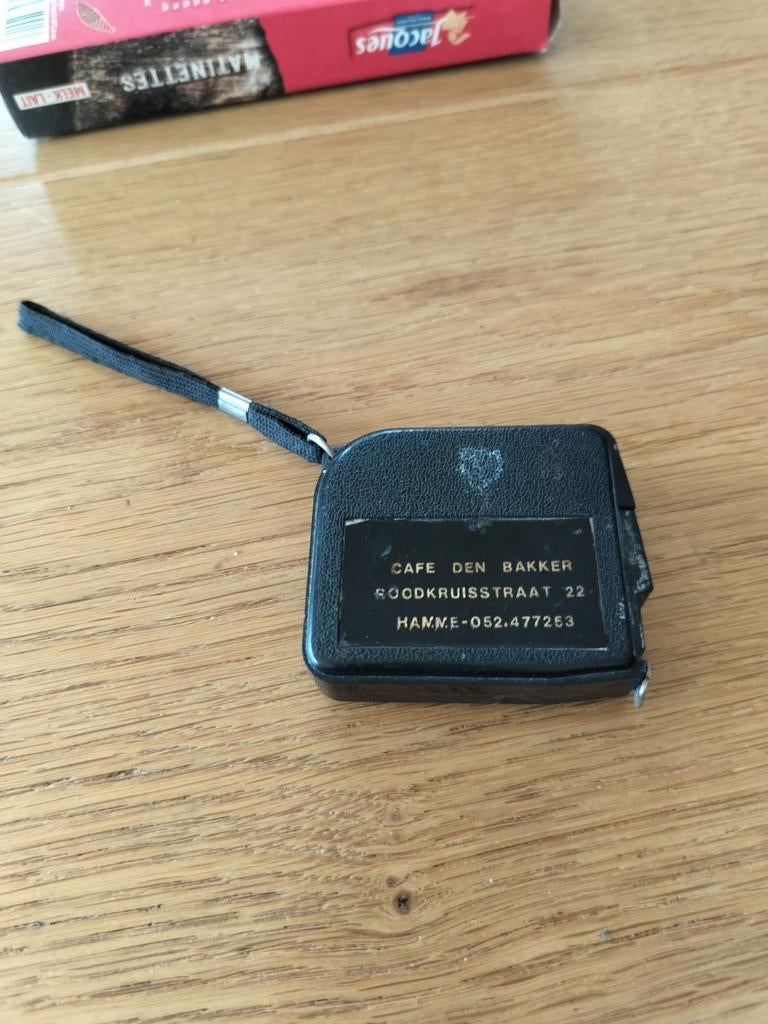 Hamme - rolmeter reclame Café Den Bakker, Ophalen of Verzenden, Gebruikt