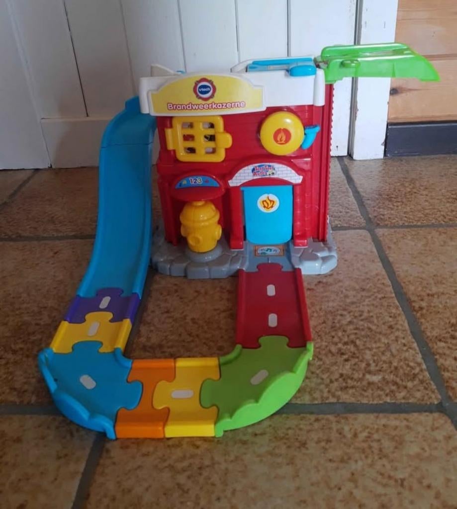 VTech toet toet auto brandweerkazerne, Ophalen of Verzenden, Gebruikt