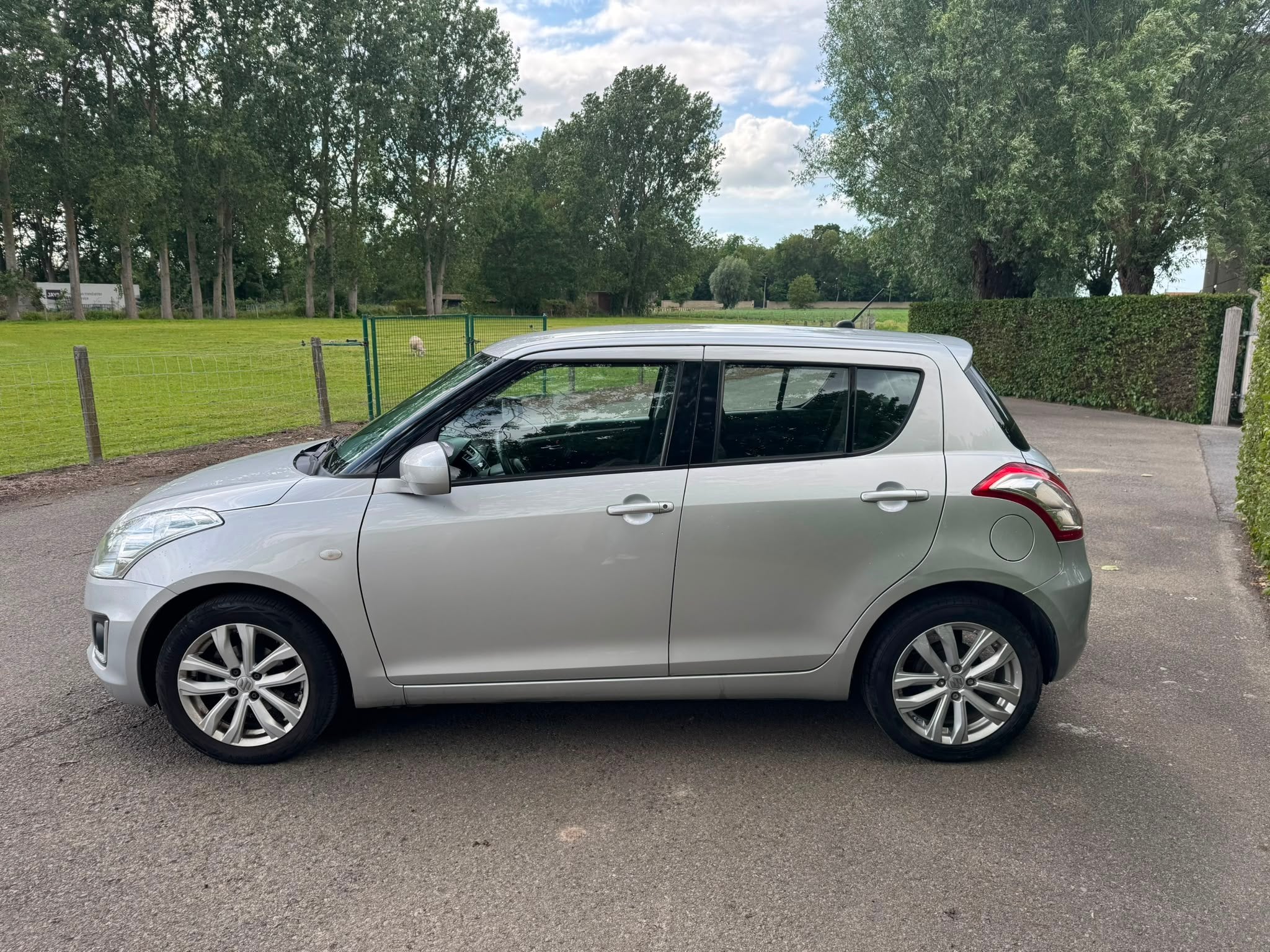 Suzuki Swift 1.2 grand luxe airco 5d 69kw (bj 2016), Auto's, Suzuki, Voorwielaandrijving, 116 g/km, Gebruikt, Swift